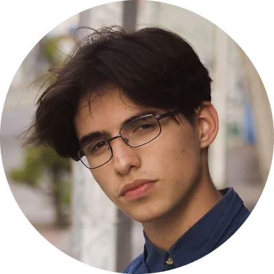 Marcus Webb, in glasses and a blue shirt