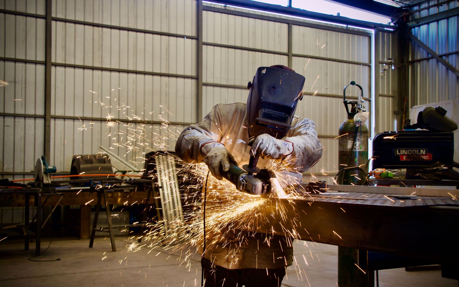 Six new apprentices in the fabrication shop