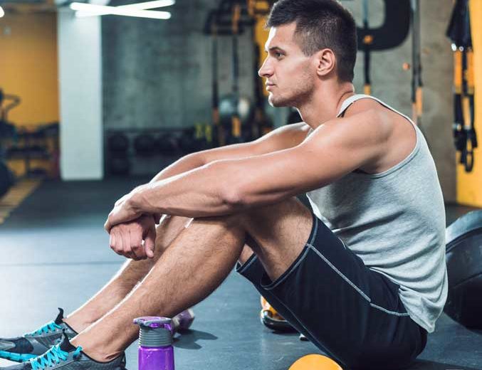 A body builder is inside the gym
