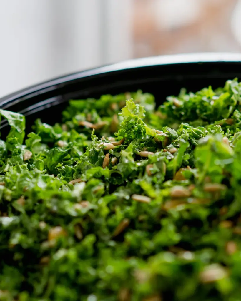 Curly kale in a black bowl