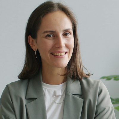 Sarah Whitcombe, paraplanner at Ridgeway Advisory, smiling in a grey blazer