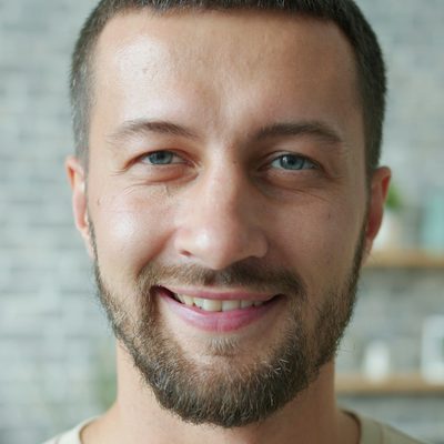 Mark Ellison, a member for eight months, smiling at home after a morning session
